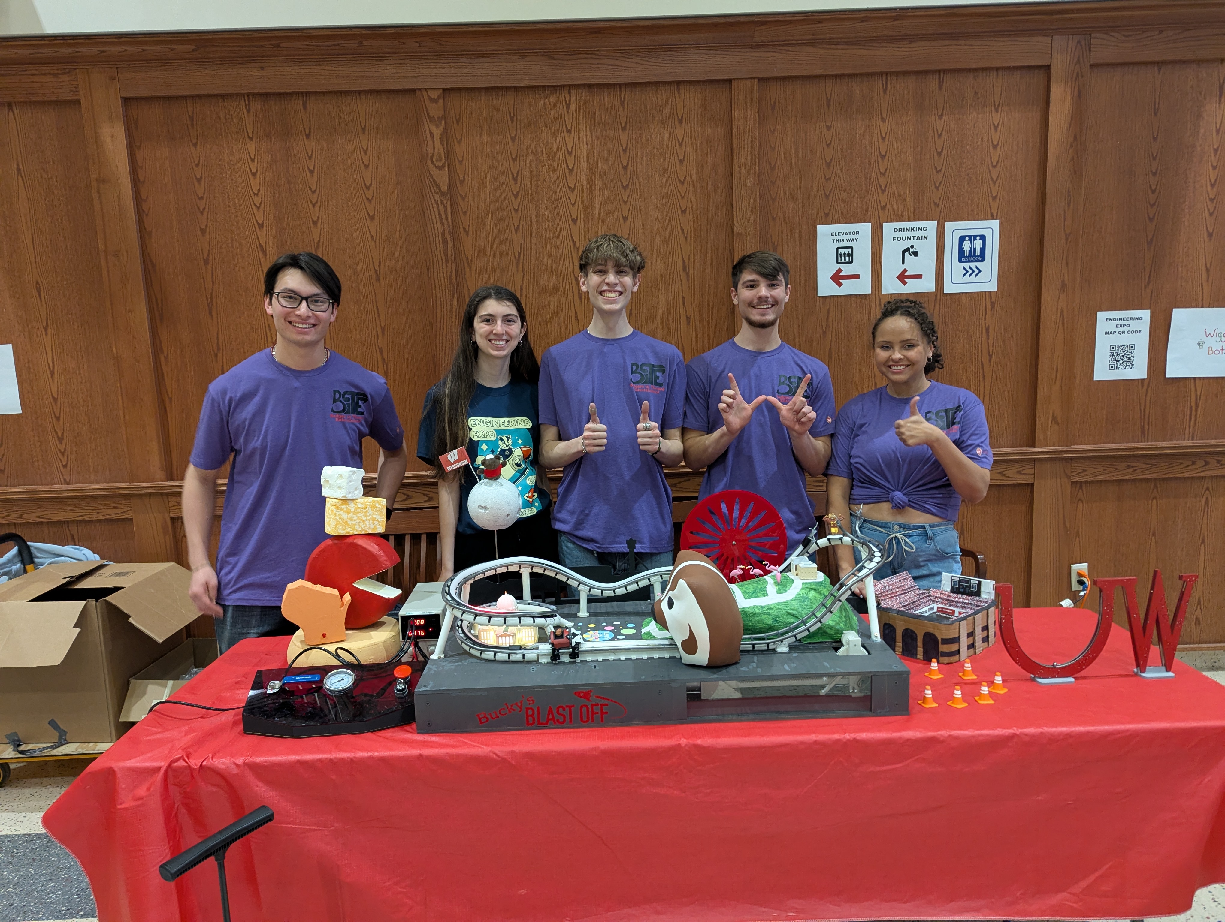 The team with the model at Engineering Expo